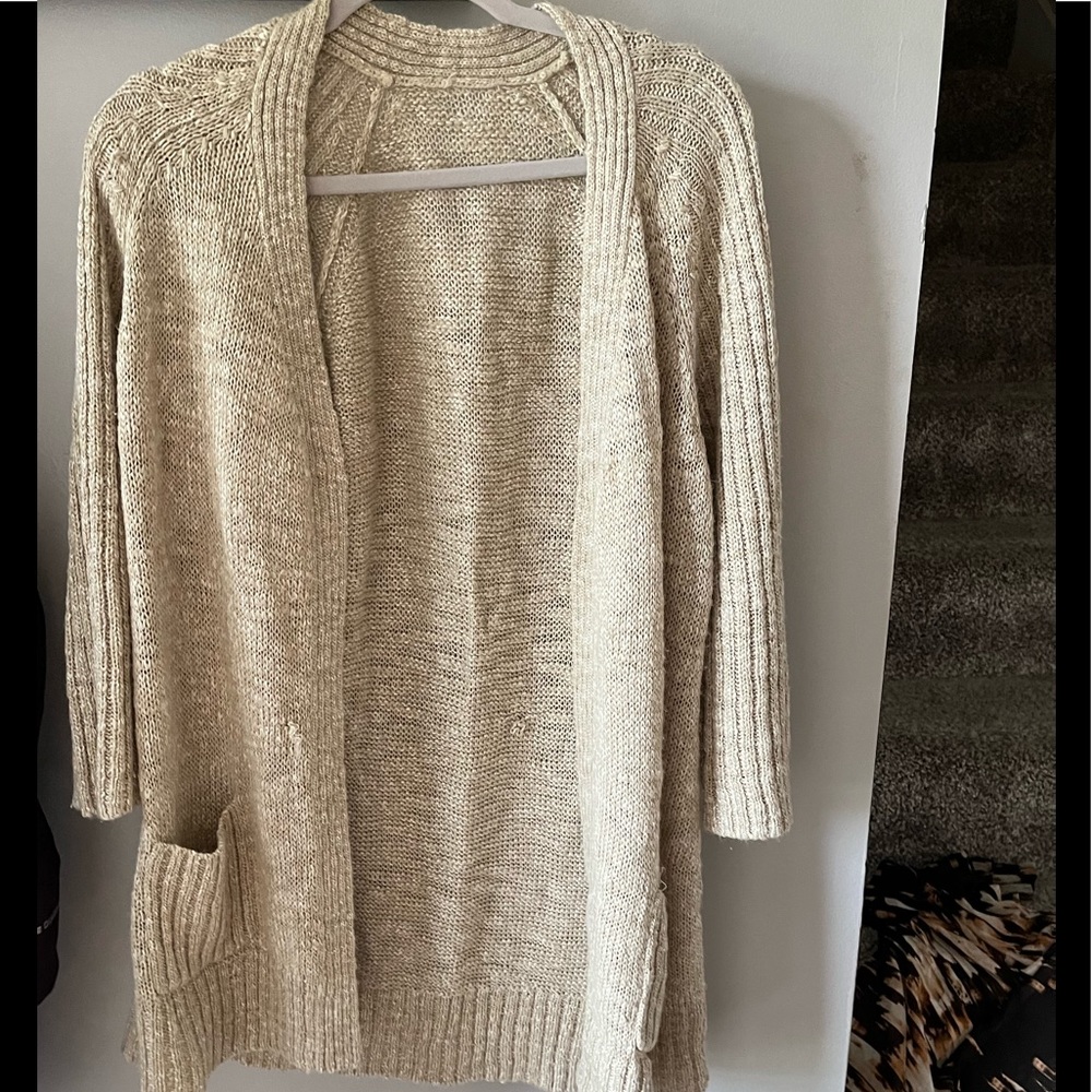 Cream sweater.